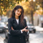 Young pretty woman in classy outfit